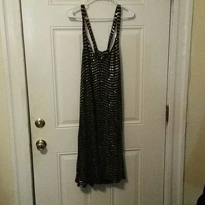 Black and gold sequined party dress